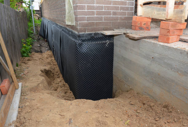 SJ Waterproofing Pros technician performing targeted Waterproofing assessment in Rancocas, NJ